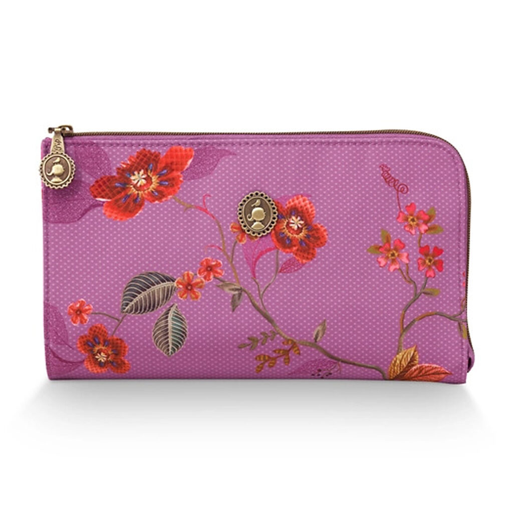 Pochette cosmétique à fleurs, couleur fuchsia.